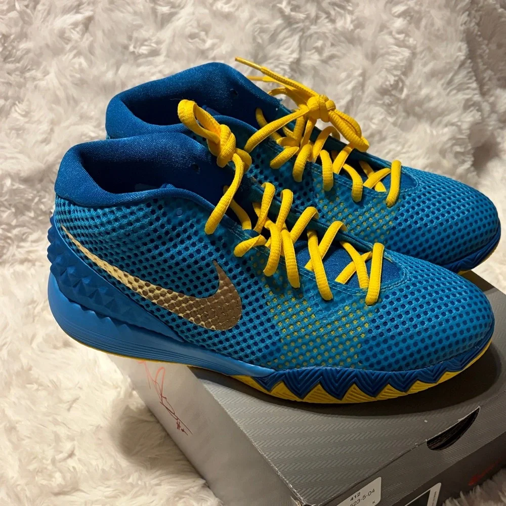 Nike Kids Vibrant Blue and Gold Sneakers